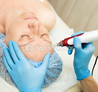 Depositphotos-114689626-beautician-makes-fractional-mesotherapy-to